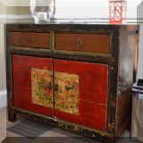 F09. Asian-inspired painted cabinet. 33”h x 39”w x 17”d 